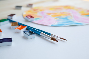 Watercolor paints and drawing supplies