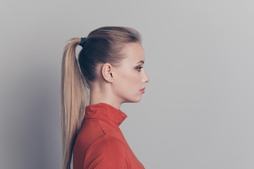 Profile side view close-up portrait of her she nice-looking lovely sweet adorable winsome attractive calm girl in red sweater isolated over gray pastel background