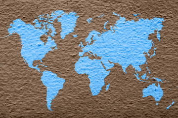 world map on blue cement wall background