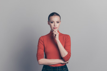 Portrait of her she nice-looking pretty attractive winsome charming cute content girl wearing red sweater touching chin isolated over gray pastel background