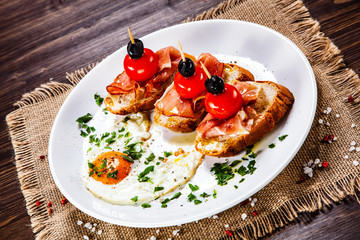 Breakfast - fried egg and sandwiches