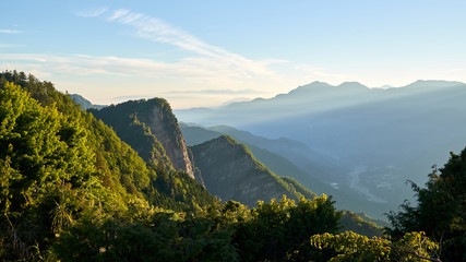Sunrise, Alishan mountain, Taiwan. Popular tourist sightseeing attraction. Early morning.