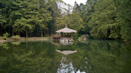 Outdoor pavilion and Sister's ponds, Alishan Forest Recreation Area, Chiayi County, Taiwan. Calm atmosphere.    
