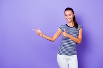 Portrait charming pretty millennial confident cool promoter advertise give feedback advise choose decide information discount present fashionable outfit trousers ponytail isolated purple background