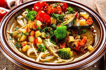 Ramen - soup with noodles and vegetables