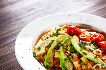 Ramen - soup with noodles and vegetables