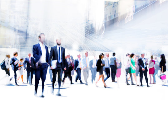 Business people rushing in the City. Beautiful abstract blurred image representing modern business life, success, moving concept.