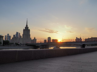 Fototapeta na wymiar Cityscape and Landscape of downtown Moscow with Modern skyscrapers, office building and Moskva river over Sunrise sky, Moscow City, Russia