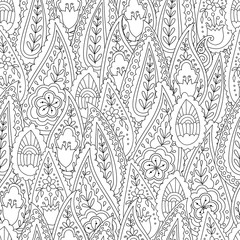 Abstract hand drawn outline doodle ornament seamless pattern with flowers and paisley . Coloring book for adult and older children.