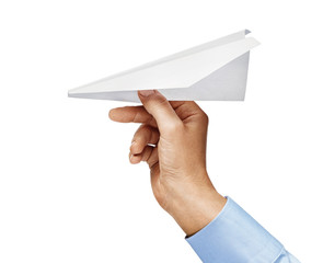 Man's hand in a shirt holds paper plane isolated on white background. Close up. High resolution product