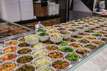 The delicious food on the plate is in the gourmet street