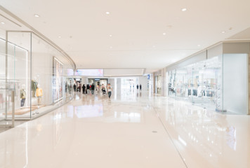 Abstract blur and defocused shopping mall in department store interior for background