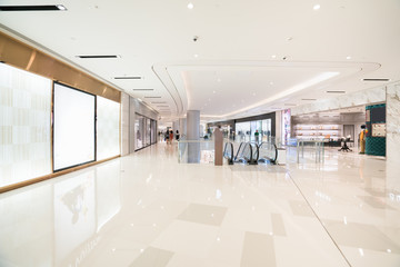 Abstract blur and defocused shopping mall in department store interior for background