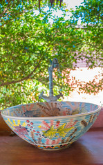 Luxury Interior wash basin bathroom with traditional thai decoration in the thailand country hotel