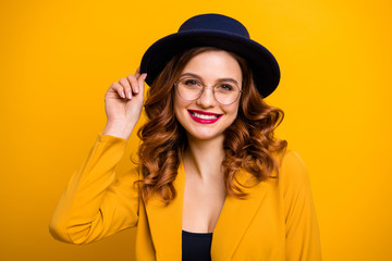 Close-up portrait of her she nice charming cute attractive lovely fascinating sweet luxury chic gorgeous cheerful wavy-haired lady in yellow blazer isolated on bright vivid shine orange background