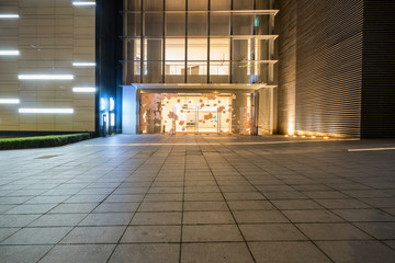 Obraz na płótnie Canvas Shopping mall building at night, Chongqing Financial City, China
