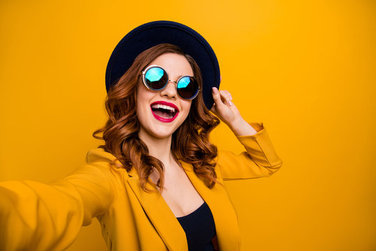 Close up photo beautiful dreamy funky she her lady make take selfies vacation white perfect teeth red pomade lips lipstick wear hat sun specs formal-wear suit isolated yellow bright background