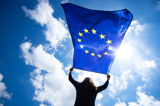 Woman with EU flag.