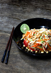 Papaya salad with shrimp, famous Thai food, Thai Salad, "Somtum" cuisine, Background, Lao, Southeast Asia, somtam, green papaya, sweet, salty, tangy, and spicy flavor, recipe, street, Ingredients 