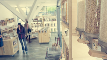 Fototapeta premium Dispensers for bulk shopping with various healthy ingredients encouraging zero waste lifestyle.