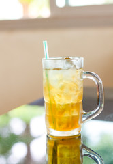 Yellow water in herbal glass