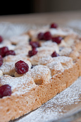 Cherry pie with heart shaped on the rustic background