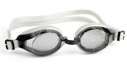 goggles for diving  in water droplets on white background