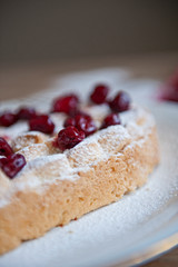 Cherry pie with heart shaped on the rustic background