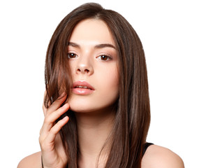 Fototapeta premium beauty portrait of a young beautiful brunette girl with brown eyes and straight long flowing hair isolated on white background