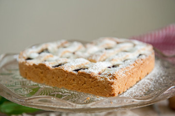 Cheery pie with heart shapes. Woman decoration homemade  cake.