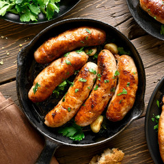 Sausages in frying pan