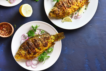 Roasted fish on plate