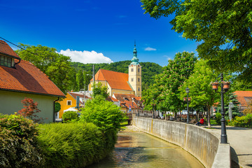 Samobor, Croatia, catholic church and river in the center of city, beautiful spring day