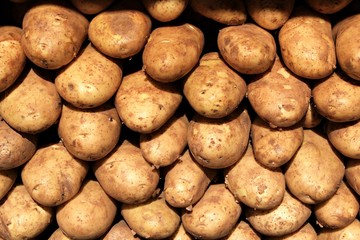 Stall with potatoes at street market