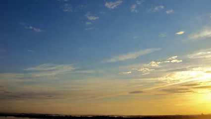 Por do sol no rio Guaíba, na cidade de Porto Alegre, estado do Rio Grande do Sul, pais Brasil.