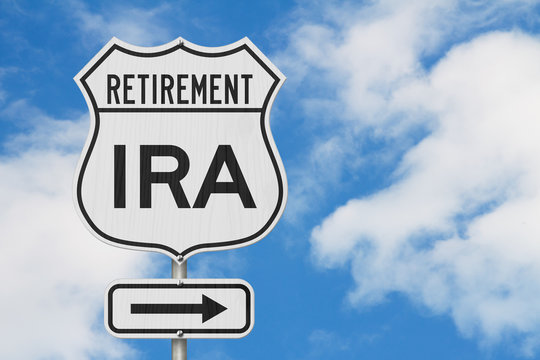Retirement with IRA plan route on a USA highway road sign