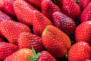 Fresh red strawberriies background.
