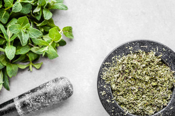 Preparing natural herbal tea with mint leaves and dried mint, top view © alicja neumiler