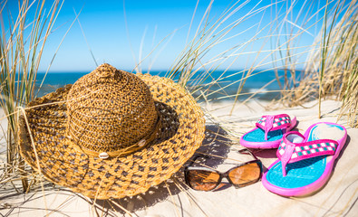 Flip flop and other beach accessories, summer holiday vacation landscape, Baltic Sea, Poland