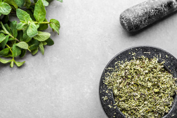 Green organic mint and dry herb of mint, top view