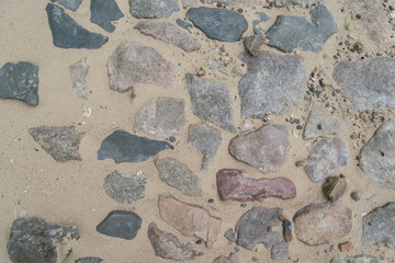 Stones of the old pavement, which appeared due to the shallowing of the Volga River in Kazan, Russia