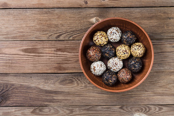 Energy balls made from a natural mixture of dried fruits and nuts(dates,dried apricots,raisins,walnuts,prunes). Healthy diet.
