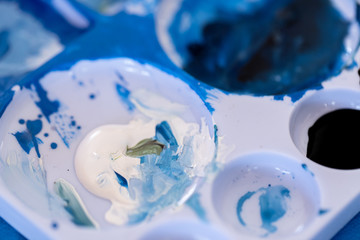 Close up of different color oil paint, Patterns or backgrounds of various colors, colors on the fabric.