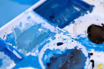 Close up of different color oil paint, Patterns or backgrounds of various colors, colors on the fabric.