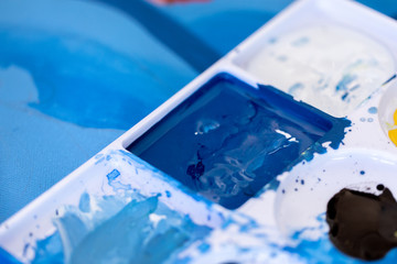 Close up of different color oil paint, Patterns or backgrounds of various colors, colors on the fabric.