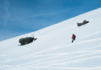 Naklejka na ściany i meble Skiers off piste in alpine ski resort