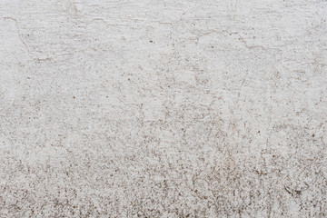 Texture, wall, concrete, it can be used as a background. Wall fragment with scratches and cracks
