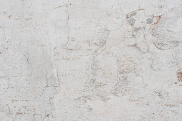 Texture, wall, concrete, it can be used as a background. Wall fragment with scratches and cracks