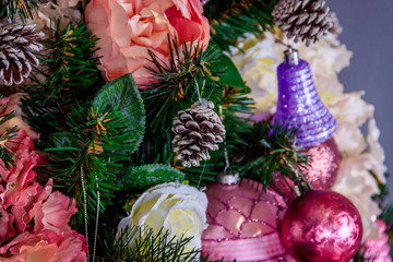 Toys on the Christmas tree. Dressed up Christmas tree. New Year's decorations.