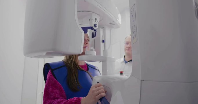 Female patient scanned by 3d xray machine